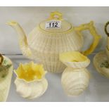 A Belleek tea pot, a milk jug and sugar pot, green