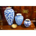 Three blue and white vases and a Japanese pottery