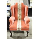 George II style reproduction wing back armchair.