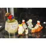 A group of Royal Doulton and Beswick figures inclu