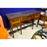 A reproduction George III bow front sideboard, glass topped., 155cm x 94cm