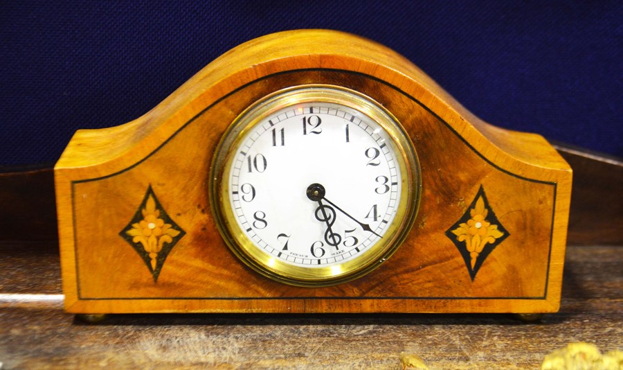 A French inlaid mantel clock