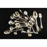A quantity of silver condiment spoons, 10.43ozt