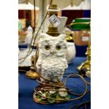 A Continental glazed pottery lamp of a white owl,
