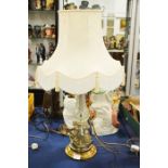 A brass and cut glass lamp with cream shade, base