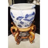 A blue and white Oriental style jardiniere decorat