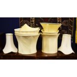 Eight cream lamp shades various sizes