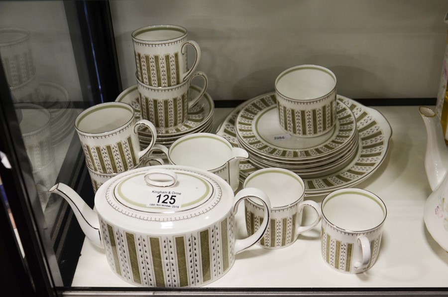 A bone china tea set comprising tea pot, milk, sug