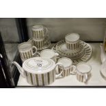 A bone china tea set comprising tea pot, milk, sug