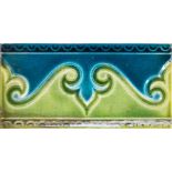 Late 19thearly 20th Century tiles, turquiose, blue olive fleur de lys, curved edge fingers, Johnson