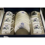 A Royal Worcester boxed six coffee cups and saucer