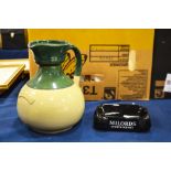 A Bourne Denby green jug, impressed Ilfracombe, 20cm high, together with a Milords Scotch ashtray.