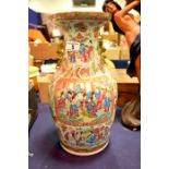 A large Chinese famille rose vase, moulded dog han