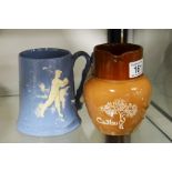 A Dartmouth pottery golfing tankard and a Cadbury