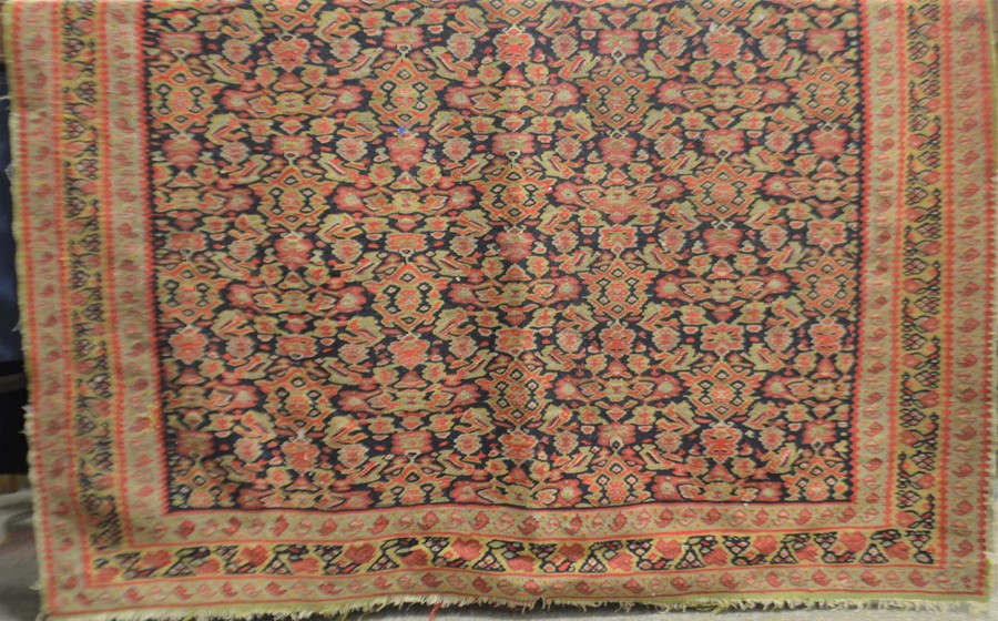 A Caucasian style rug, 126cm x 186cm