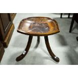 Liberty & Co, an Arts and Crafts mahogany and leather Thebes stool