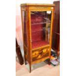 A French style ormolu mounted display cabinet