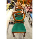 A set of six balloon back chairs upholstered in green fabric, height 88cm