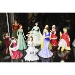 A group of Coalport and Royal Doulton figures (11)