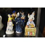 A group of Royal Doulton figures including Merlin