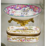 A Meissen style pill / snuff box and porcelain saucer on ormolu stand (2)