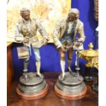 A pair of white metal figurines entitled 'Musicien