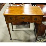 An antique style oak lowboy, fitted three drawers, on tapered supports and pad feet, width 80cm