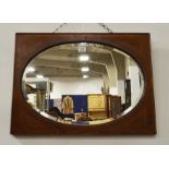An Edwardian mirror, mahogany with inlaid stringin
