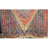 A Caucasian style rug, 119cm x 131cm