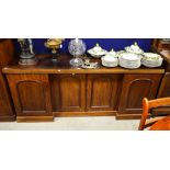 A Victorian mahogany inverted breakfront sideboard, fitted four cupboard doors, Width 184cm,