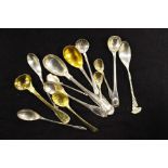 A quantity of silver condiment spoons, 5.14ozt
