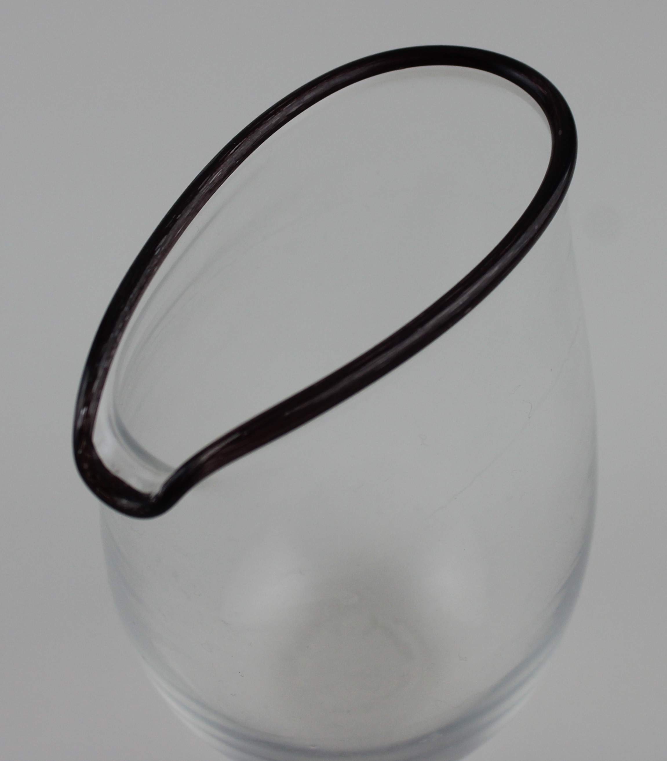 An art glass jug (Simon Moore 1959-Present), having ovaloid shape rim, black/brown rim detail, - Image 3 of 3