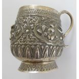 A late 19th/early 20th century Burmese silver tankard, H.9cm  Provenance: Private Collection,