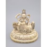 A Chinese 19th century ivory study of a deity, H.9.5cm W.10cm