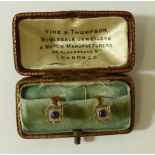 A pair of gents 9ct yellow gold cufflinks/studs, mounted with sapphires and mother of pearl,