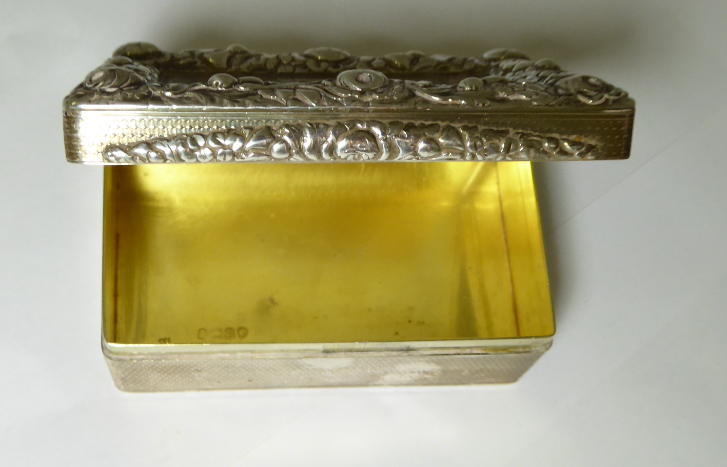 A Georgian silver box with gilt interior and running thistle border, hallmarked London 1830, maker - Image 2 of 5