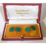 A pair of gents 9ct yellow gold green enameled cufflinks with red outer band,