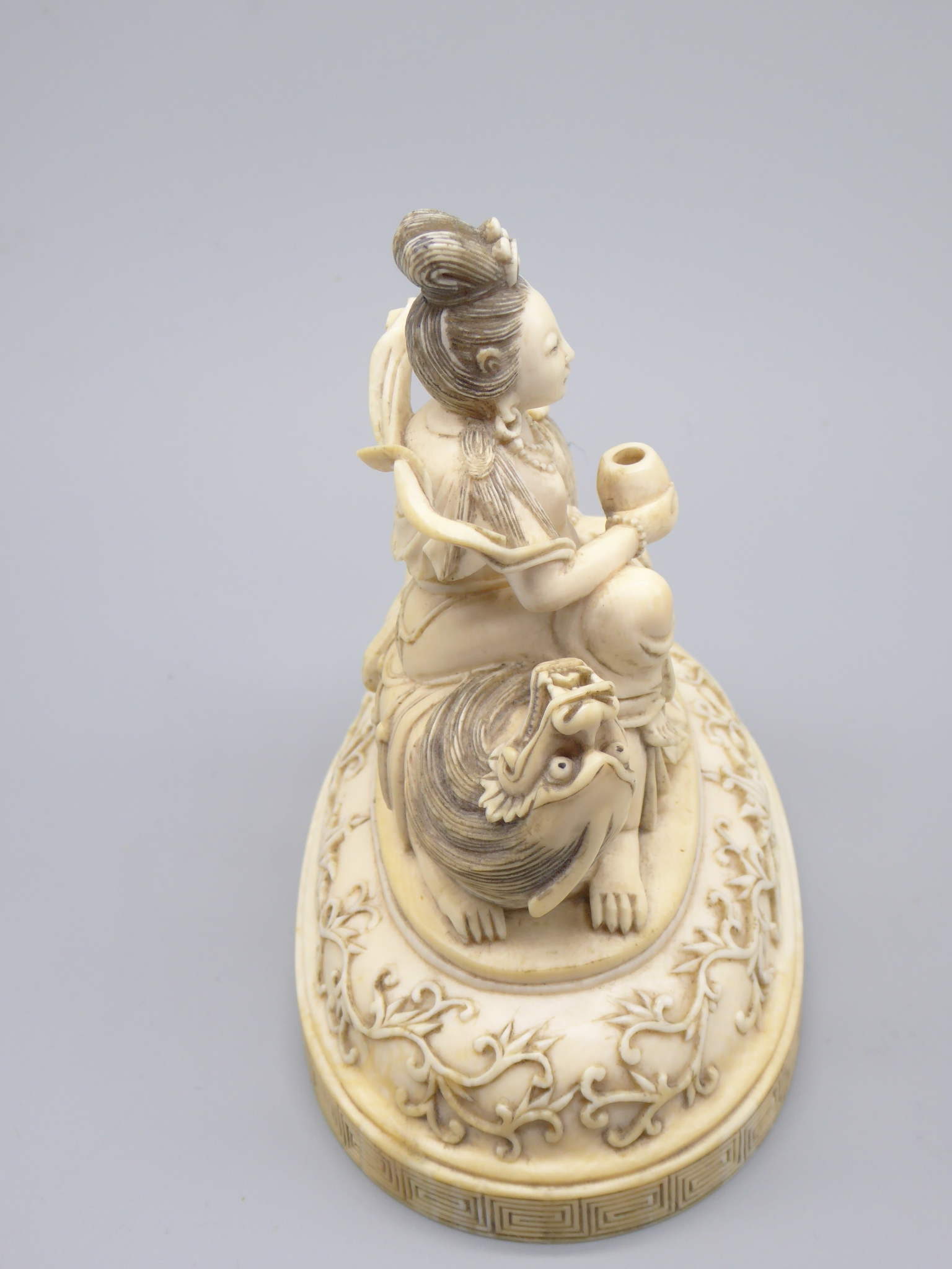 A Chinese 19th century ivory study of a deity, H.9.5cm W.10cm - Image 2 of 4