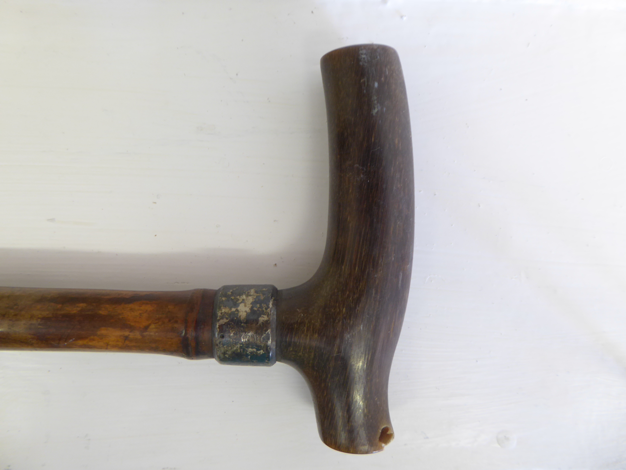 A 19th century rhino horn handled walking cane with silver collar - Image 2 of 2