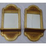 A pair of gilt shelved bevelled wall mirrors, H.60cm