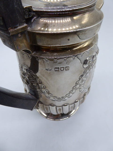 Victorian silver waterjug, repousse embossed central decor, hallmarked London 1898, maker Hawksworth - Image 2 of 3