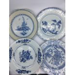 Four 18th century Chinese export blue and white plates, D.23cm (largest)