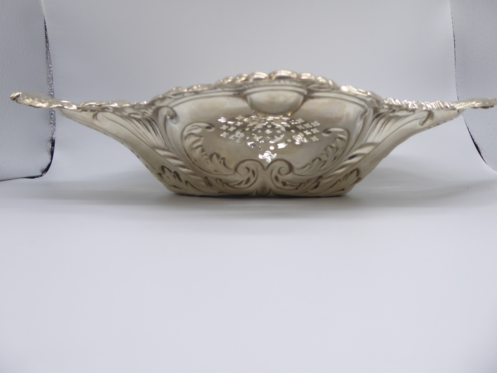 A large silver repousse embossed bonbon dish, hallmarked Sheffield 1899, maker, James Deakin & Sons, - Image 2 of 5