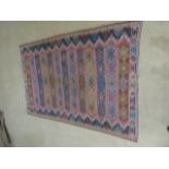 A large Kilim rug, 390cm x 205cm