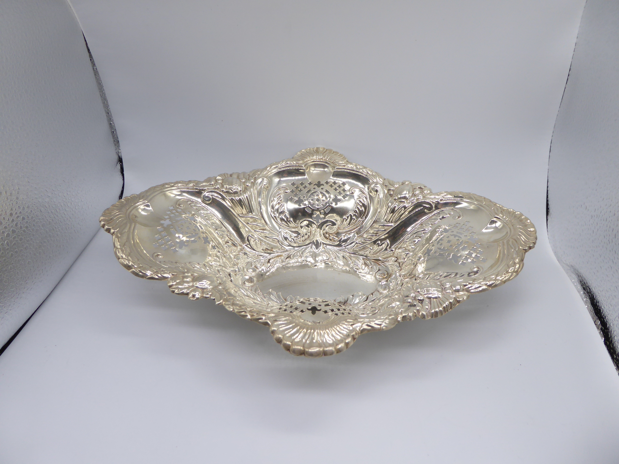 A large silver repousse embossed bonbon dish, hallmarked Sheffield 1899, maker, James Deakin & Sons, - Image 3 of 5