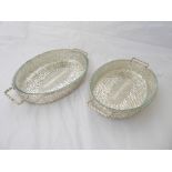 A pair of Christian Dior white metal woven table baskets with glass liners, L.42cm,