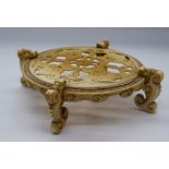 A Chinese 18th century ivory pot stand, D.16cm