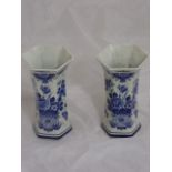 A pair of blue and white Delft flute vases, signed to bases and dated 1925, H.23cm