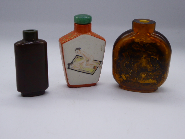 Three Japanese scent bottles, include a shunga example, marks to base, H.9cm