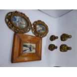 Three miniature portraits together with four casts of Saints mounted onto perspex stand (4)
